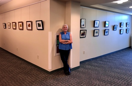 Suzanne in her exhibit